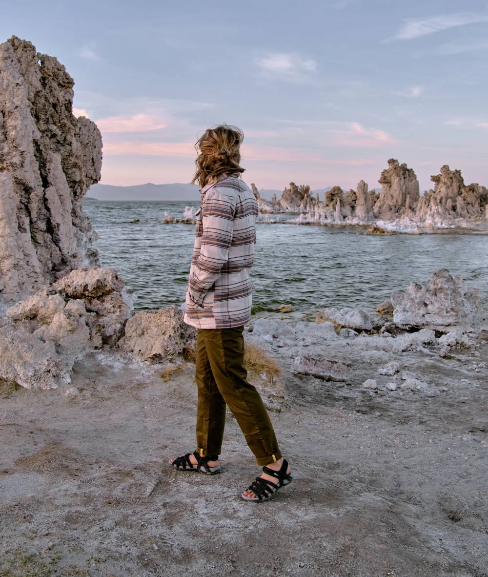 woman walking in stylish water sandals