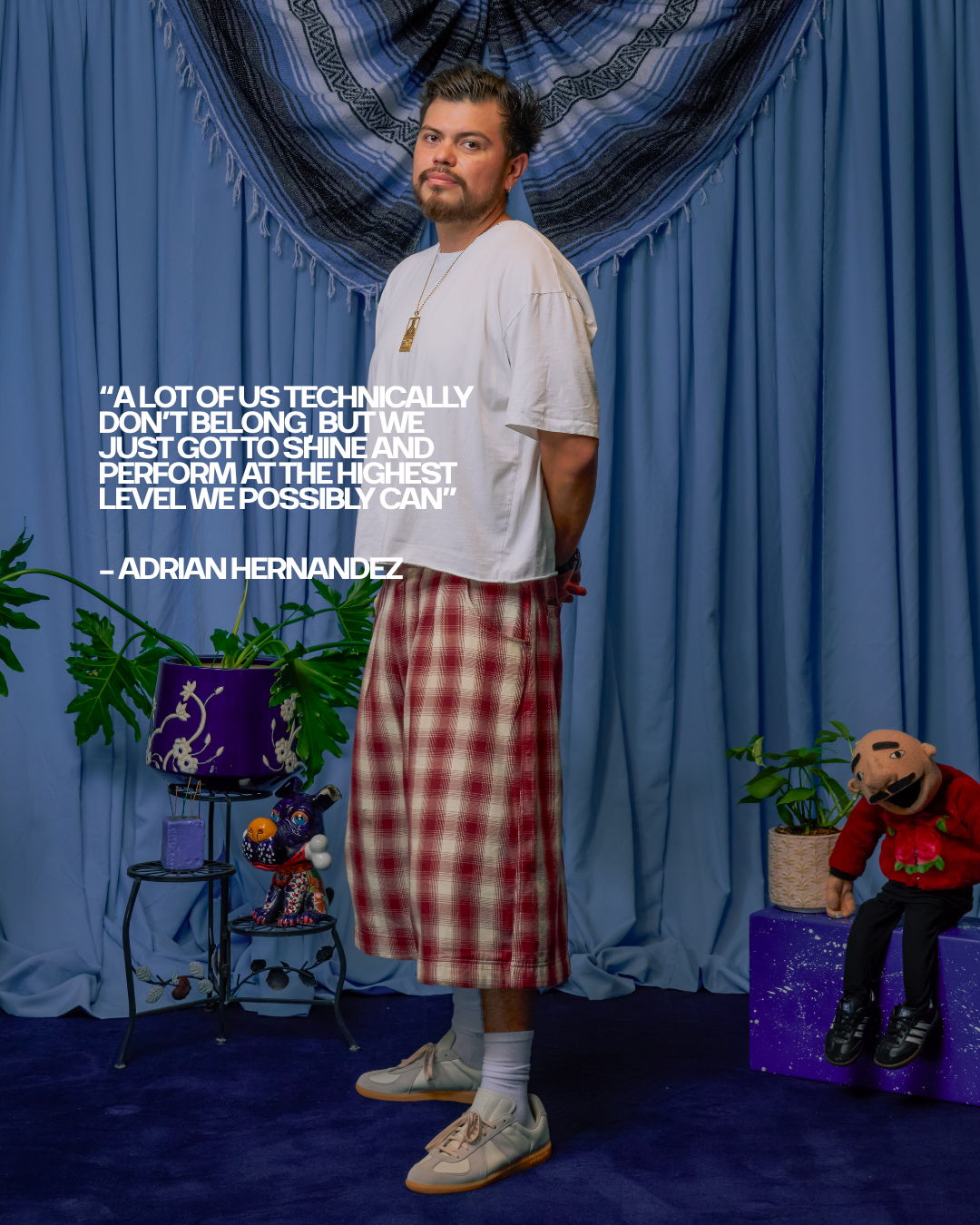 Person standing in a room with blue curtains and a quote overlay.