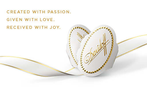 Davidoff heart shaped cigar rings with white and gold gift ribbon