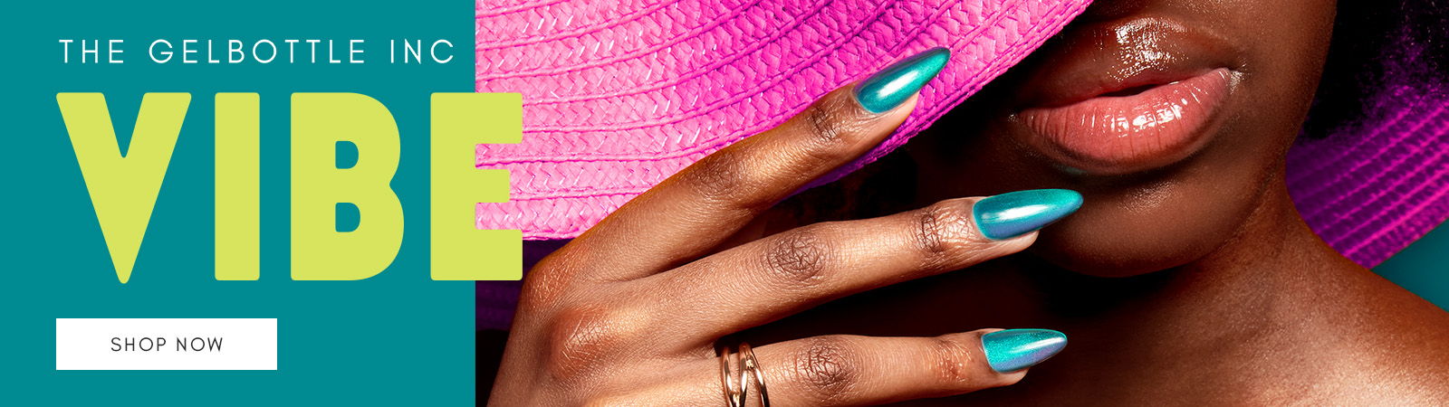 Close-up of a hand with colorful nails against a vibrant background.