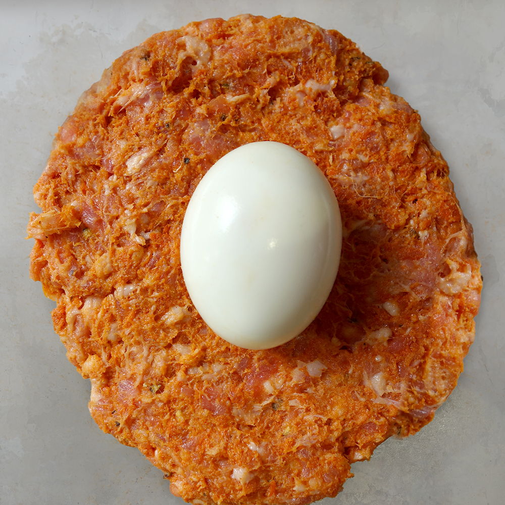 Chorizo scotch eggs with garlic aioli