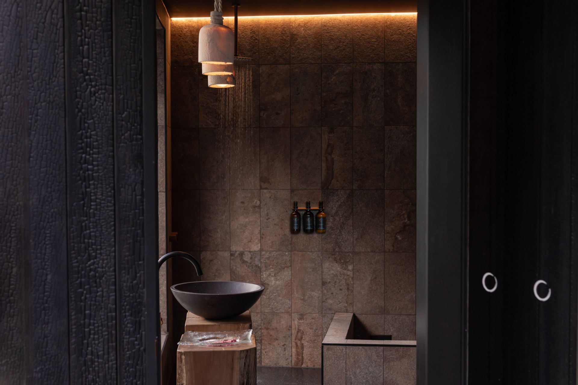 Modern bathroom interior with coral pendants