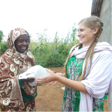 Woman handing over a lantern.