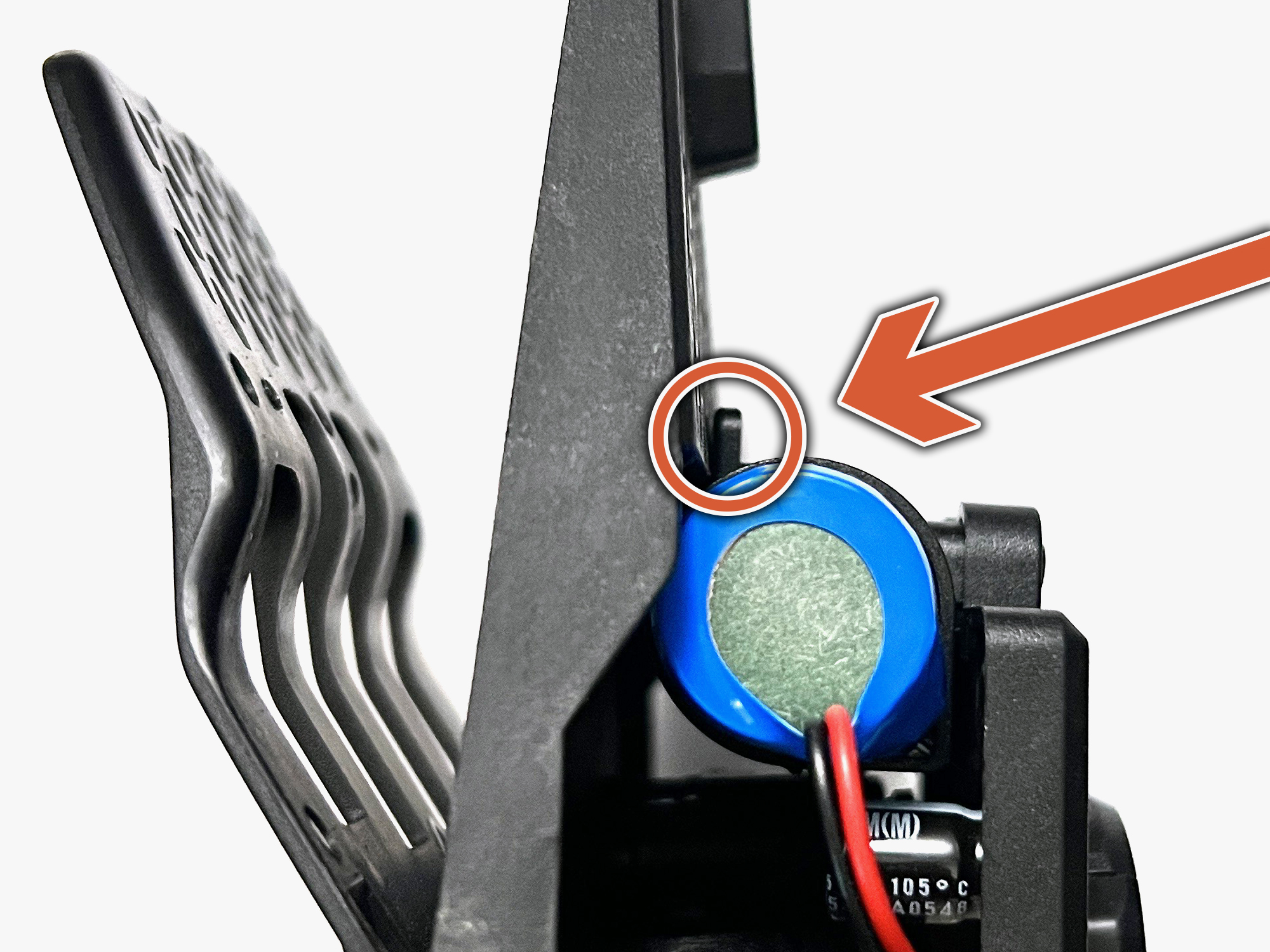 Close-up of DRV showing a battery and connection point.