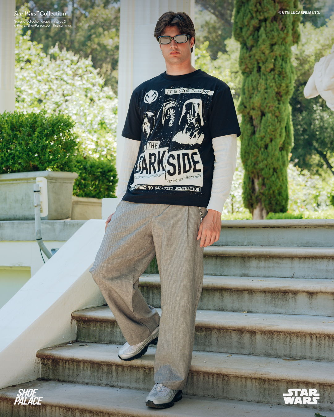 Person standing on stairs wearing a 