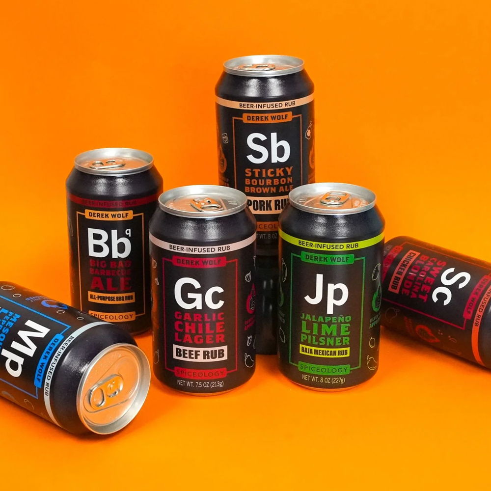 Various colorful cans on an orange background, featuring chemical symbols.