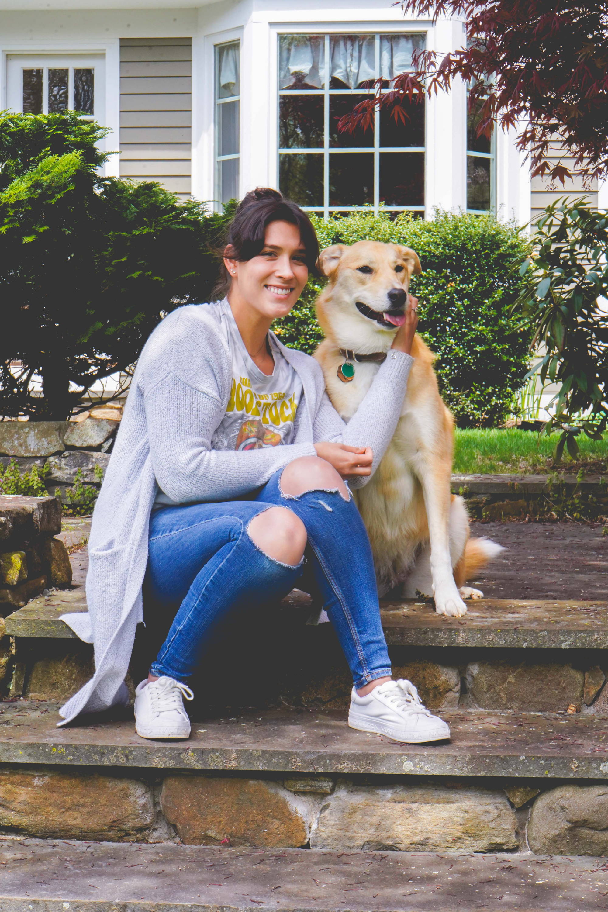Morgan Sharp, visual and marketing designer at Oma's Pride, with her dog Lula.