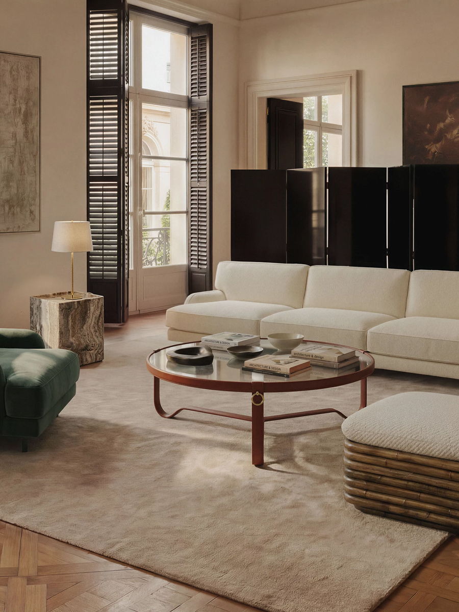 A modern, Gubi sofa in a stylish interior setting.