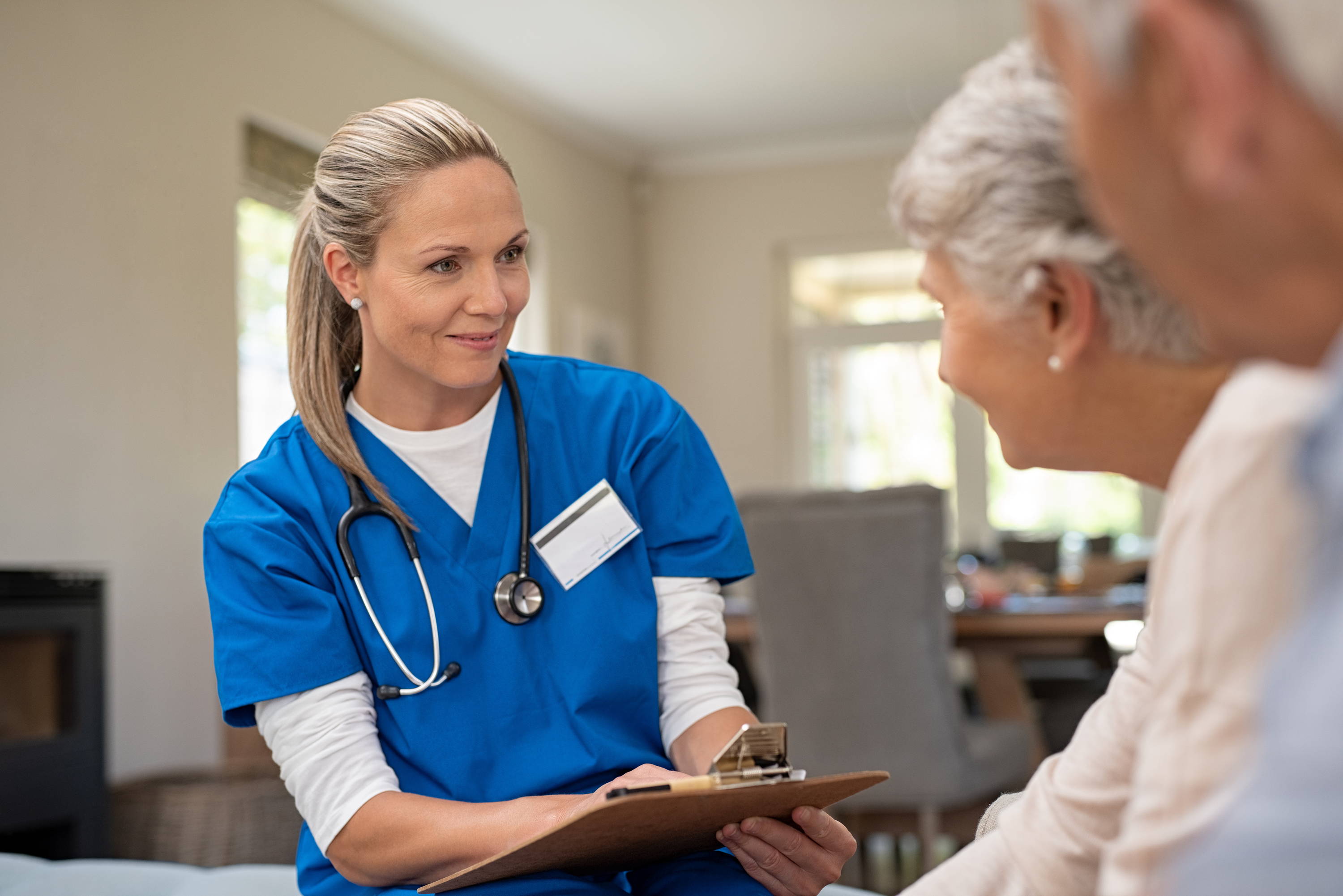 Nurse taking care of elderly patients in hospital