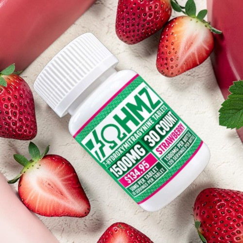 Bottle of 1500mg supplement surrounded by strawberries and pink sweets.