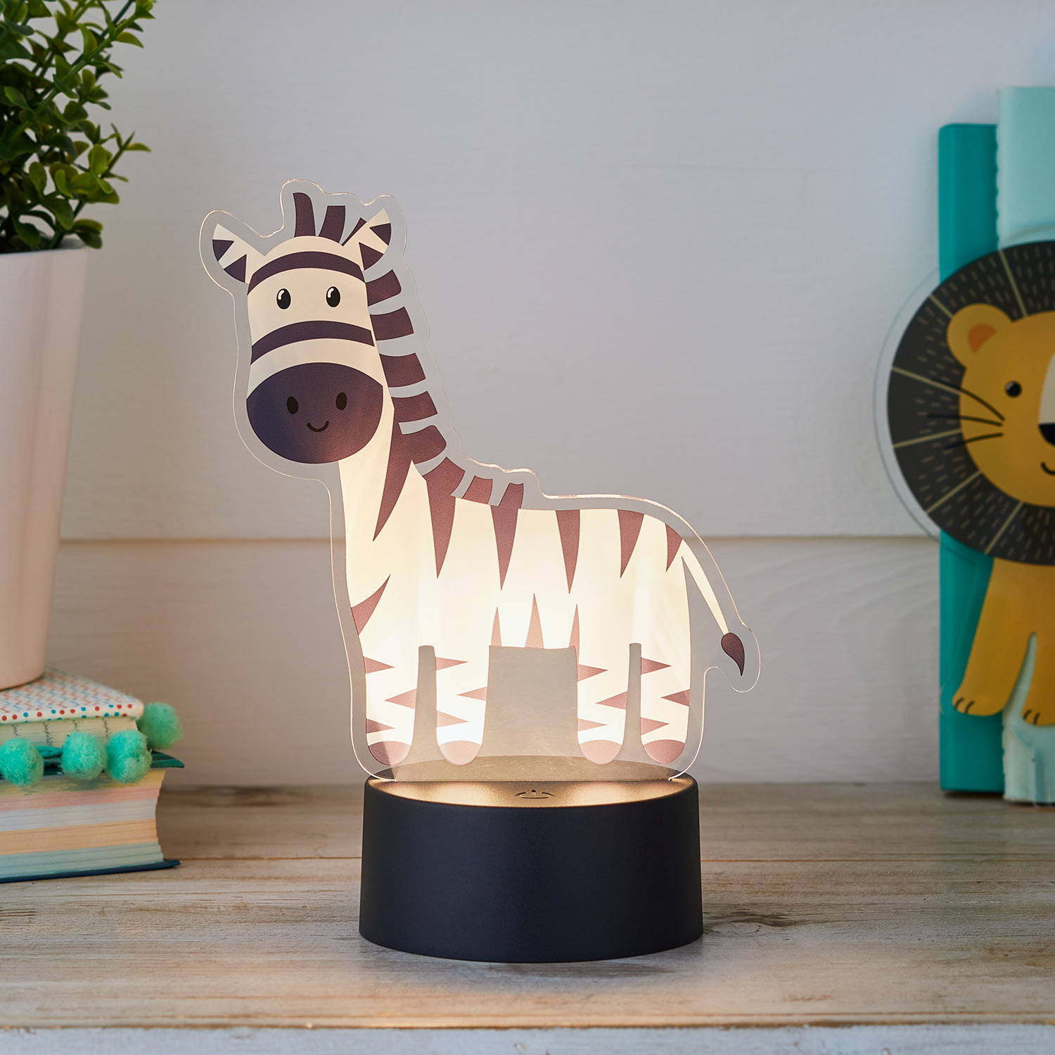 Zebra table light illuminated on table