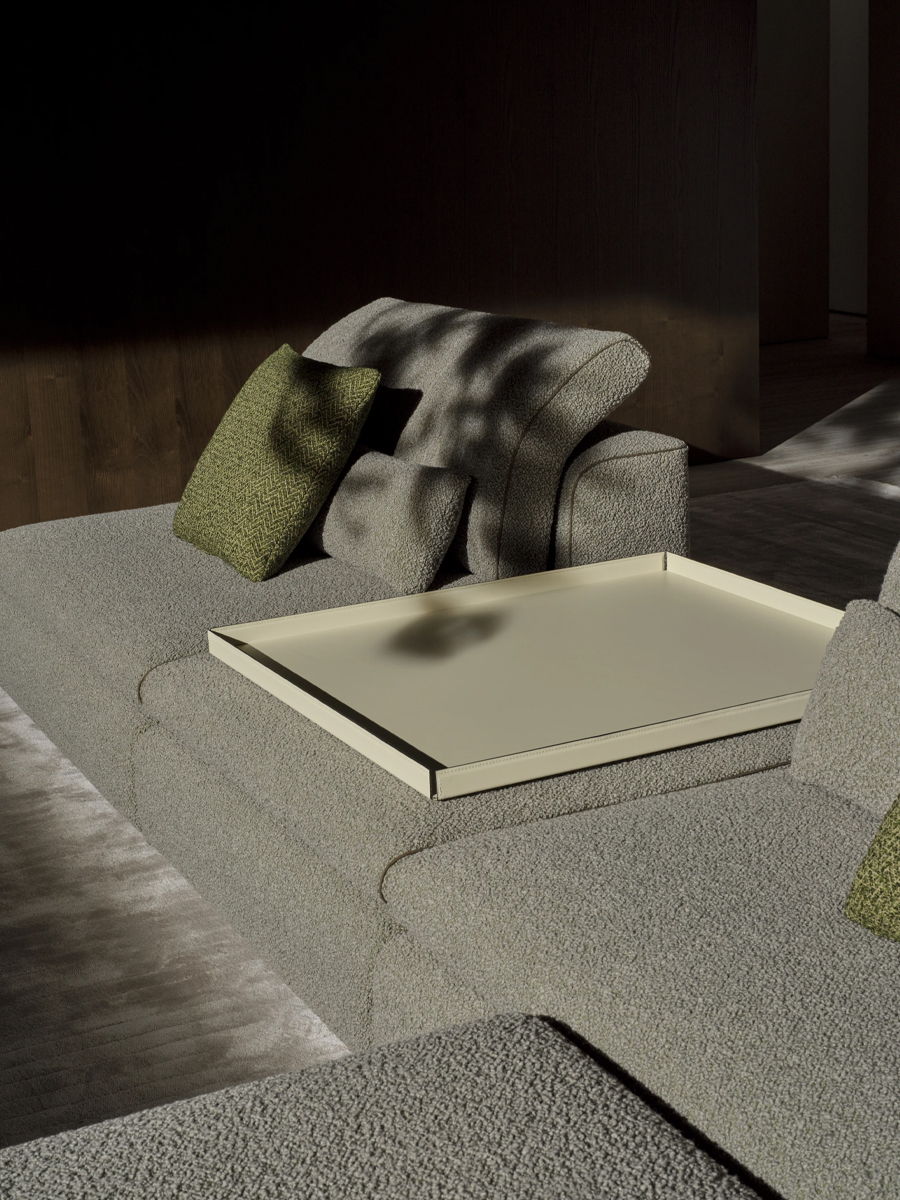 Modern living room with large windows, brown Molteni&C sofas, and minimalist decor.