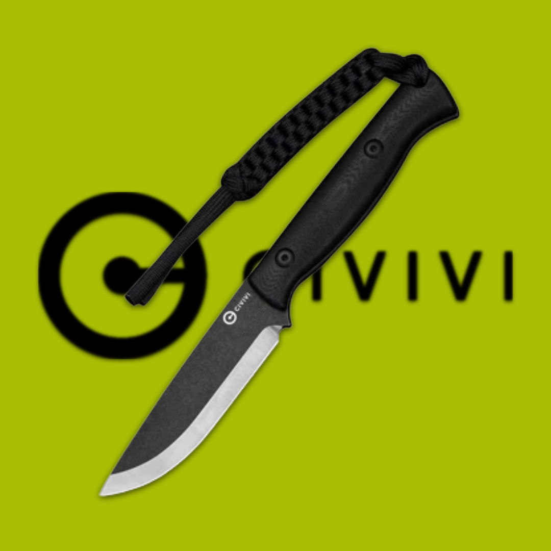 Black folding knife with a textured handle and lanyard against a green background.