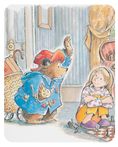 A bear in a blue coat offers cookies to a girl sitting on the floor.