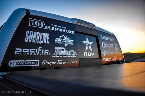 Close-up of truck rear window decals and bed cover