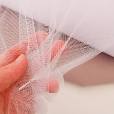 Detail of white tulle fabric