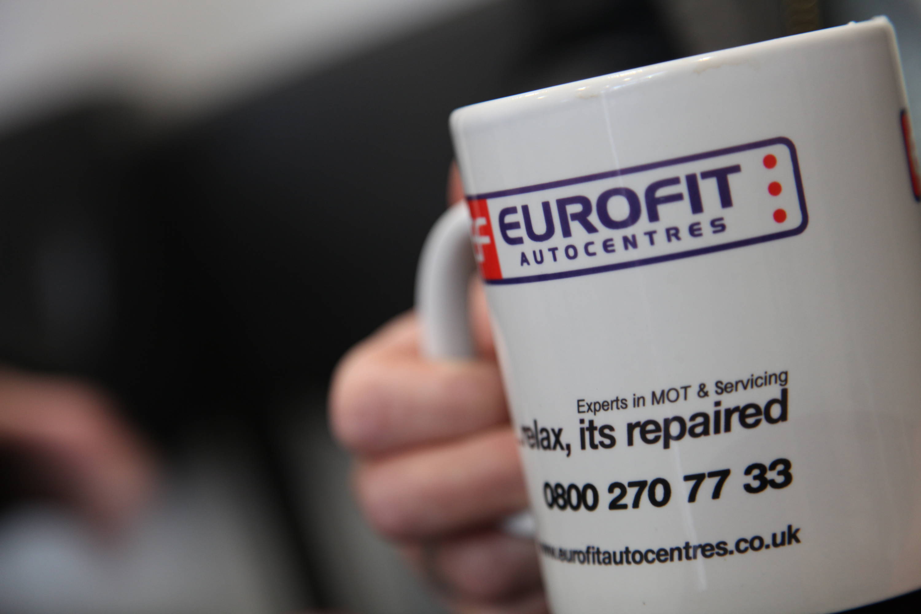 Close up of Eurofit mug with logo and contact details 