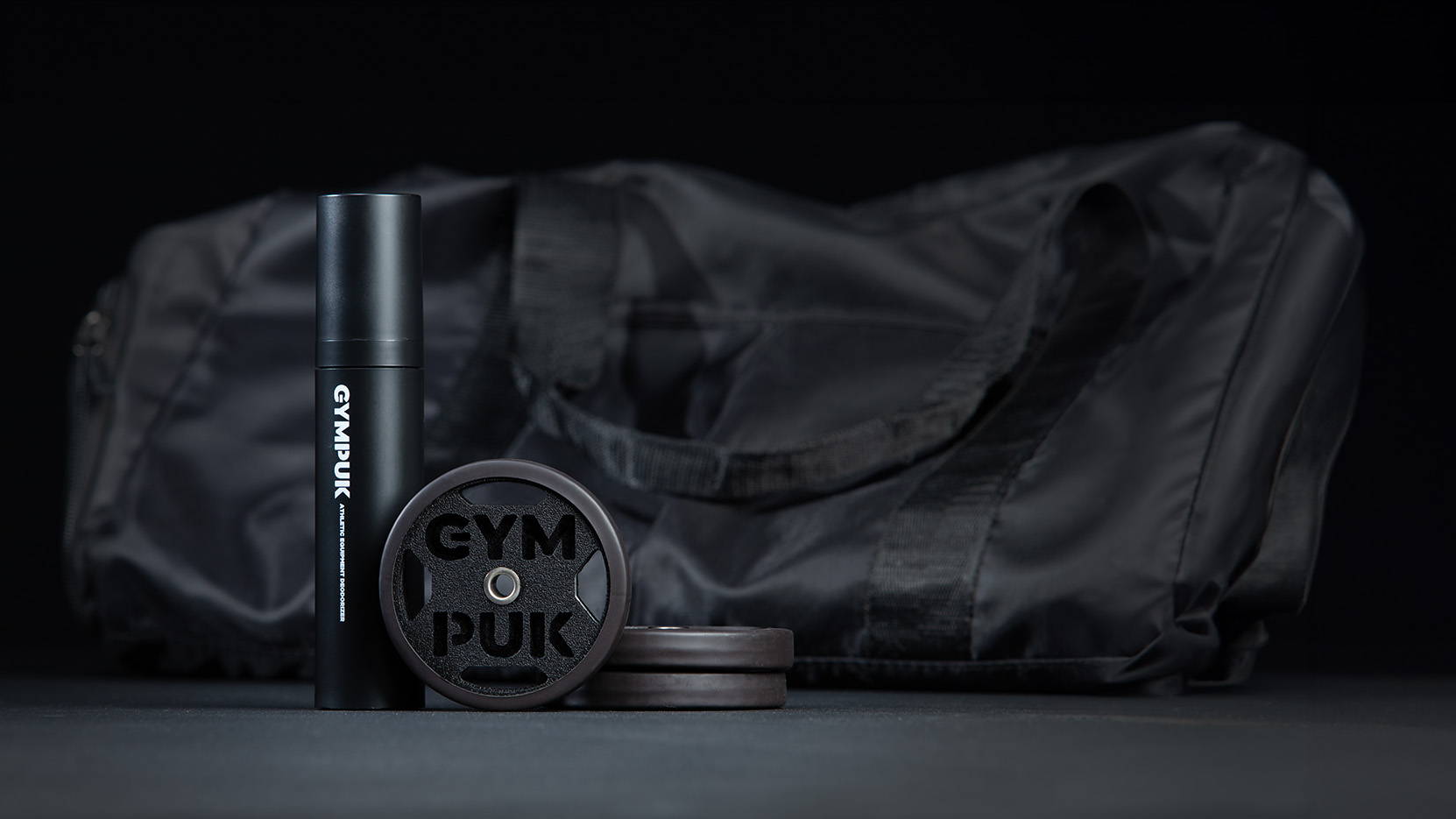 Gym bag with Gympuk Gym Bag Deodorizing Kit in front
