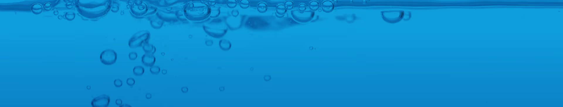 Bubbles rising in blue water background.