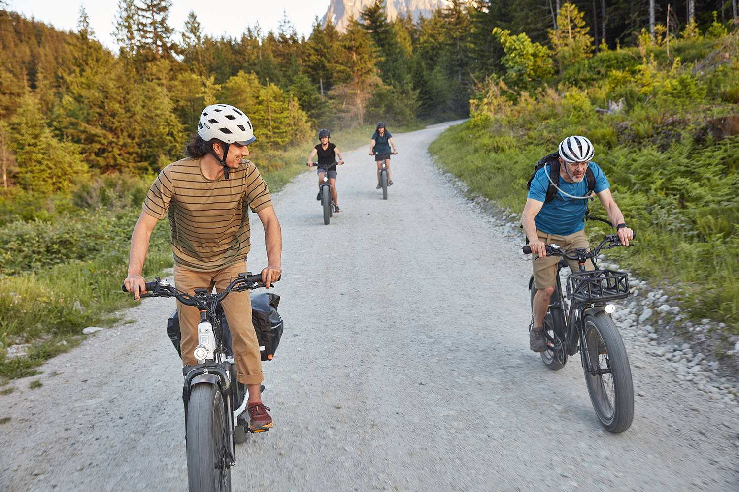 A group of people riding on Rad Power Bikes electric fat tire bikes on a trail