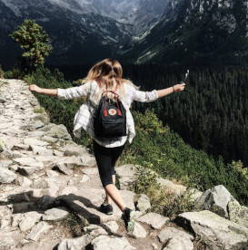 woman-skipping-on-mountain-path-being-authentic
