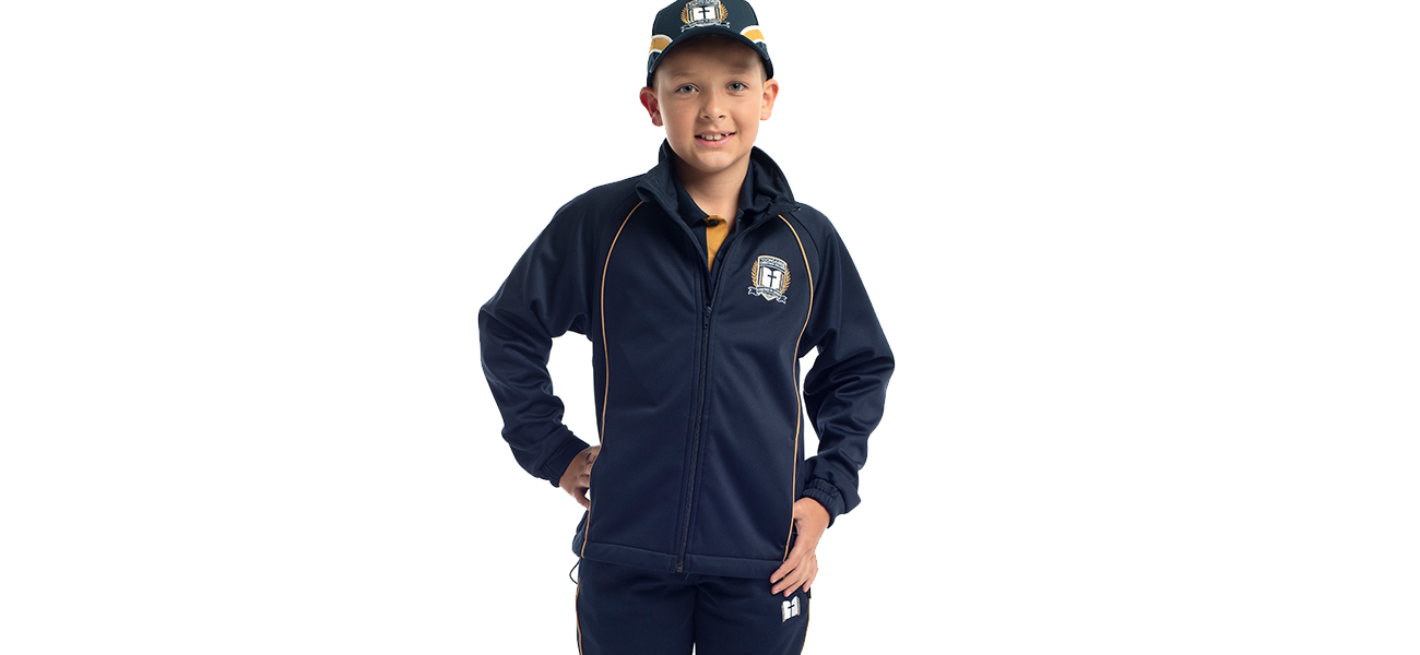 Custom raglan sleeve softshell jacket with piping detail, detachable hood and custom embroidery for Toongabbie Christian College
