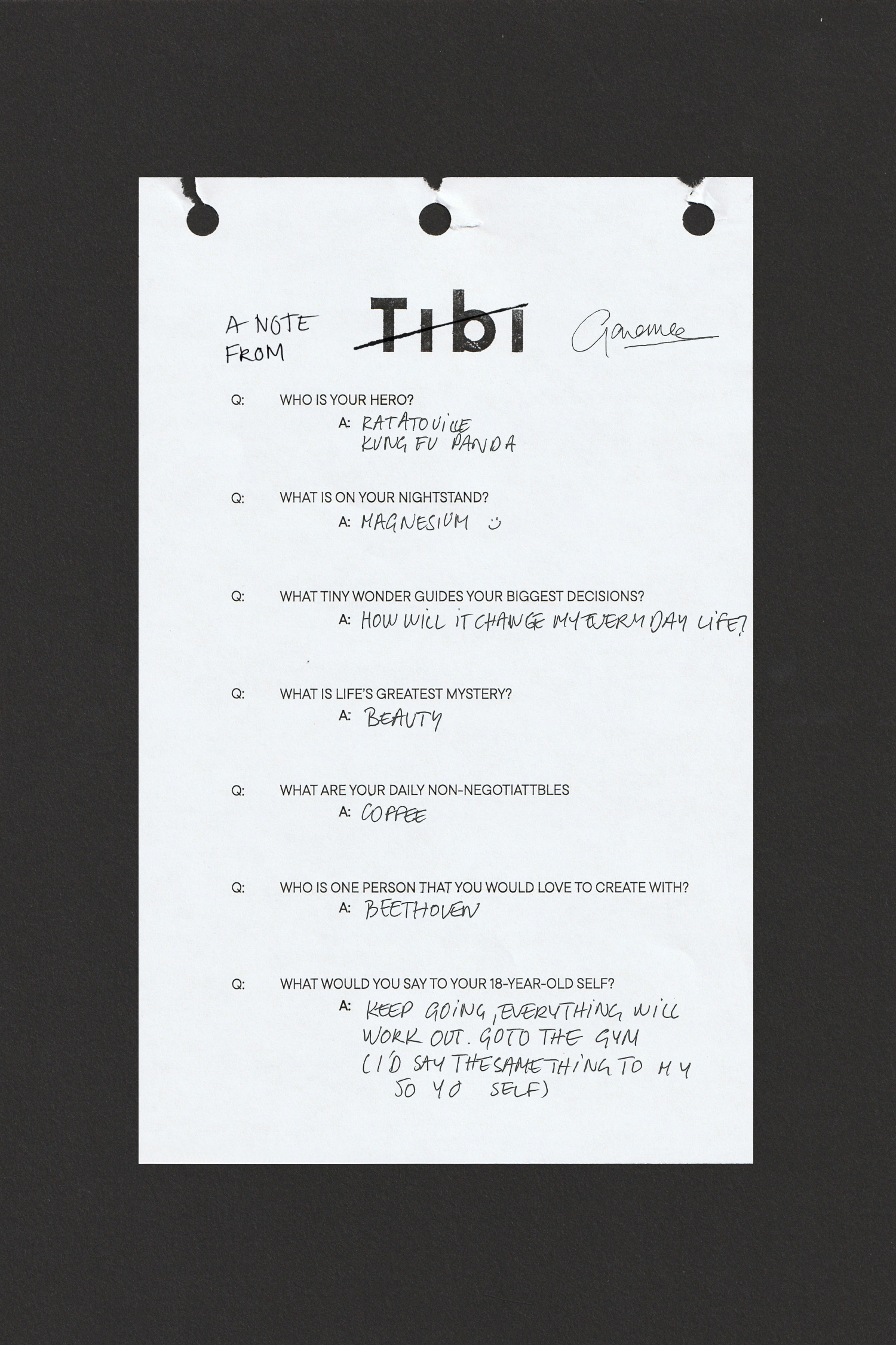 A note with questions and prompts on a white paper background.