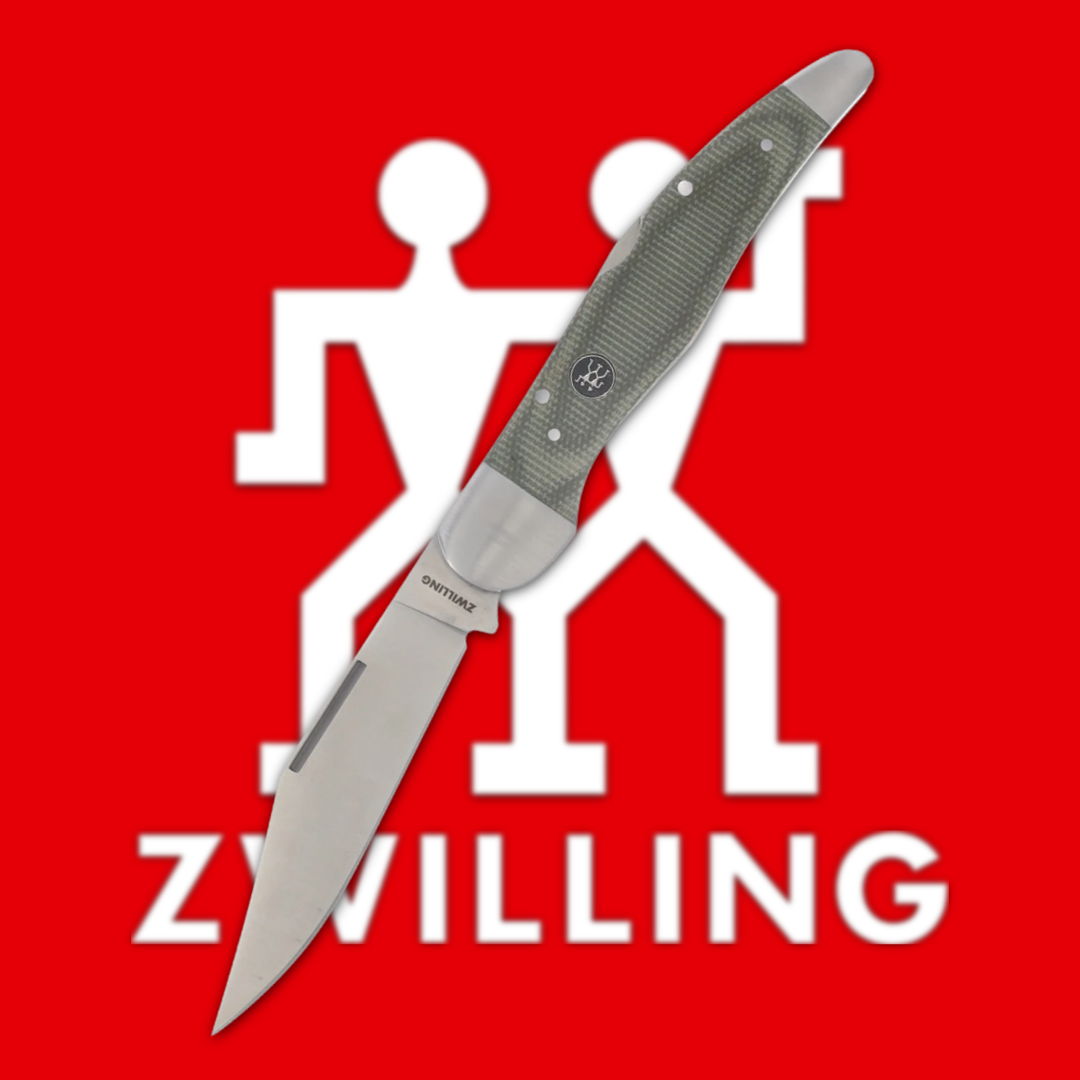 Knife over a red background with the Zwilling logo.
