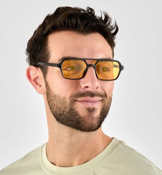 Man wearing squared aviator sunglasses with yellow lenses