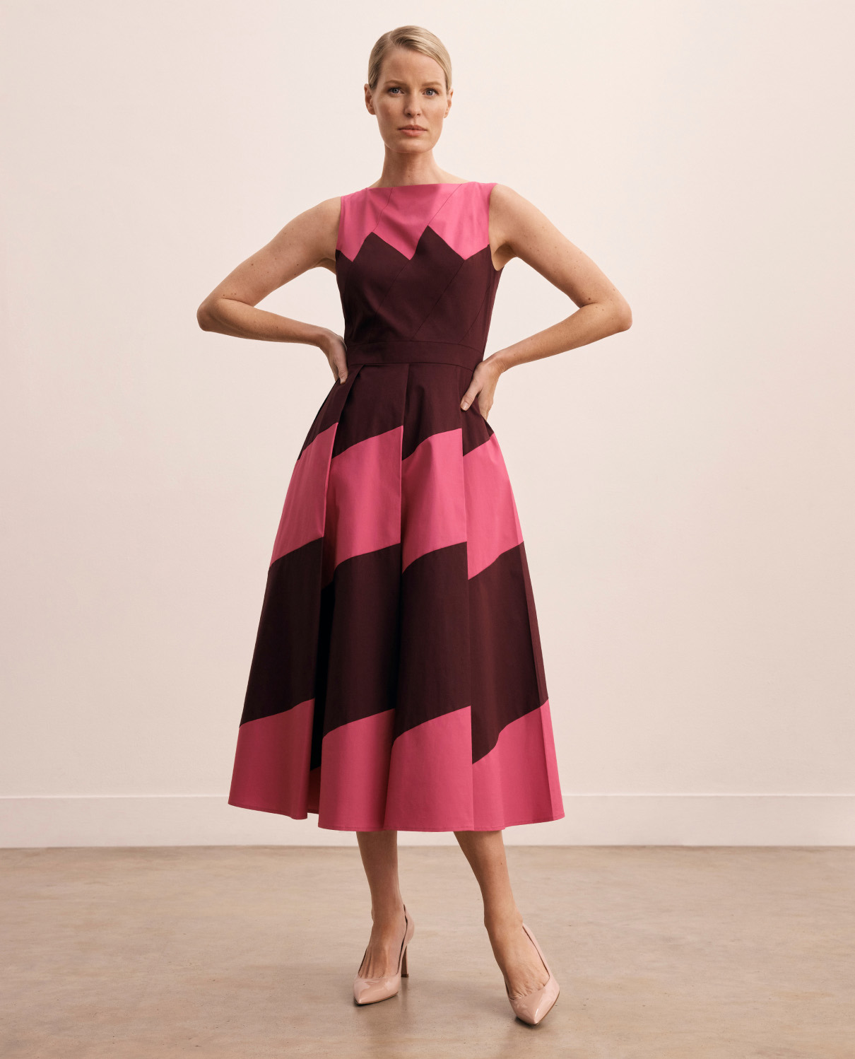 Model wearing berry pink Verania dress