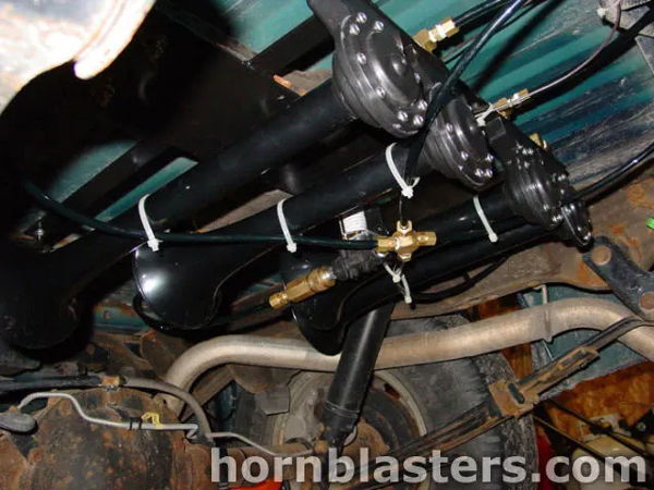 Underside view of the Conductor's Special 232 horn assembly mounted beneath Kevin's 2002 Chevrolet S10, install photo 4