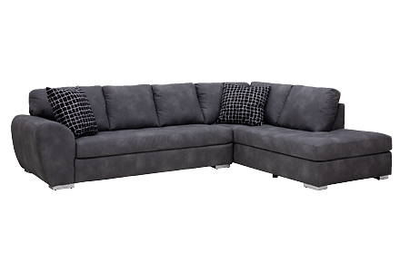 Grey sectional sofa with toss cushions.