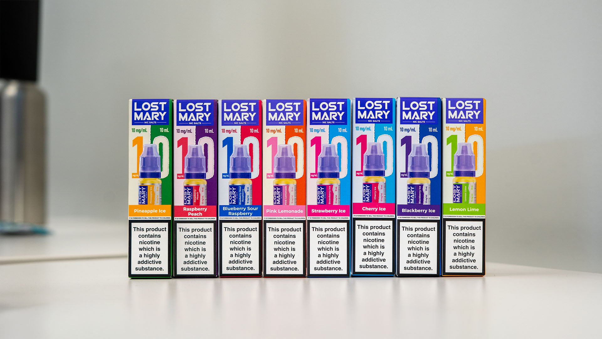A picture of 8 Lost Mary Nicotine Salt E-liquids lined up. 