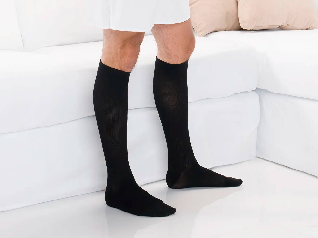 Man wearing Therafirm Compression Trouser Socks in Black