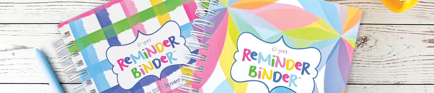 Reminder Binder® 2027-2028 2-year planner with colorful Joy in Bloom and Plaid About You covers, twin coil binding and elastic closure