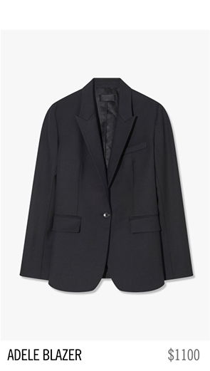 Black blazer displayed on a plain background, priced at $1100.
