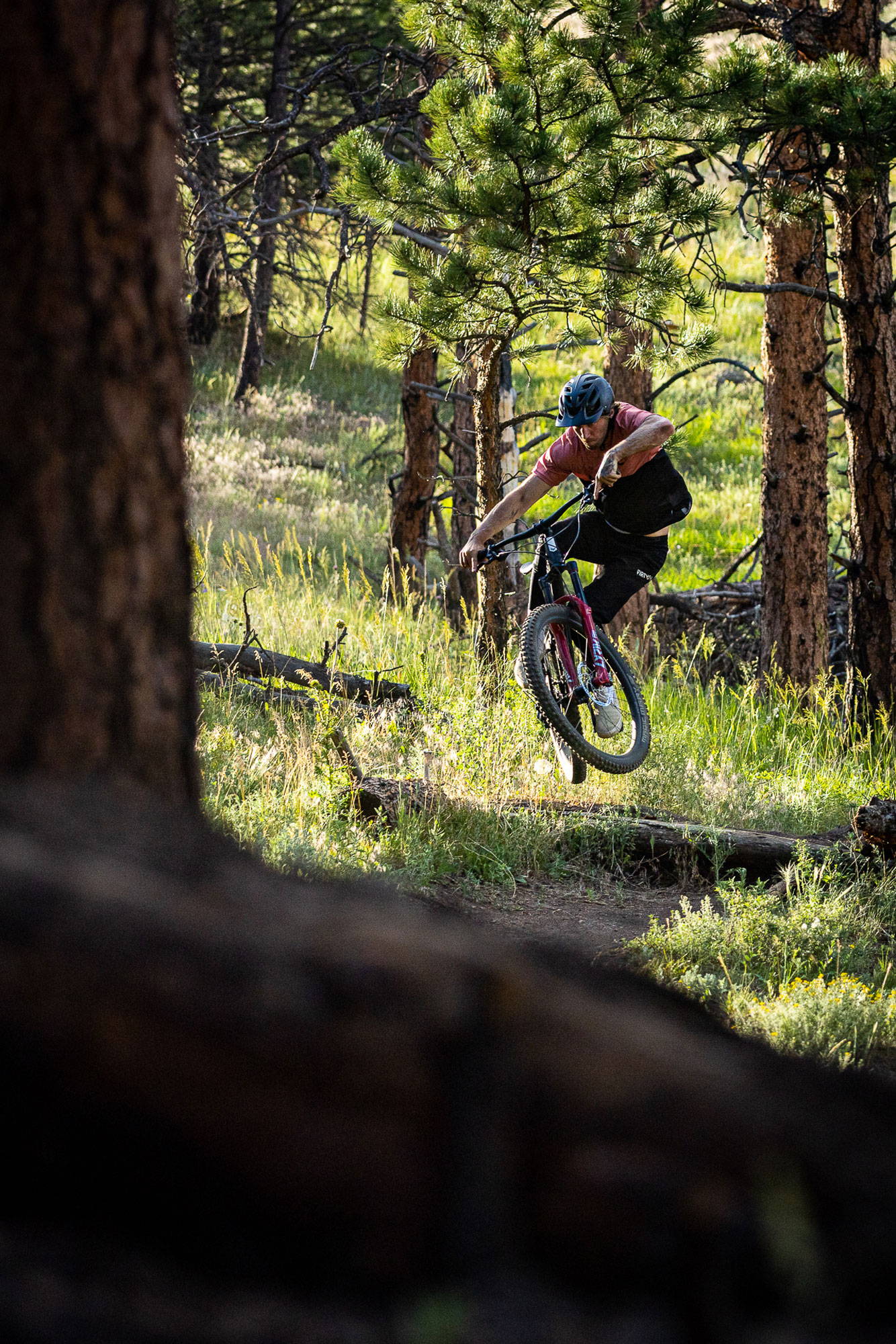 Rider getting air on Enduro Wide Wheelset