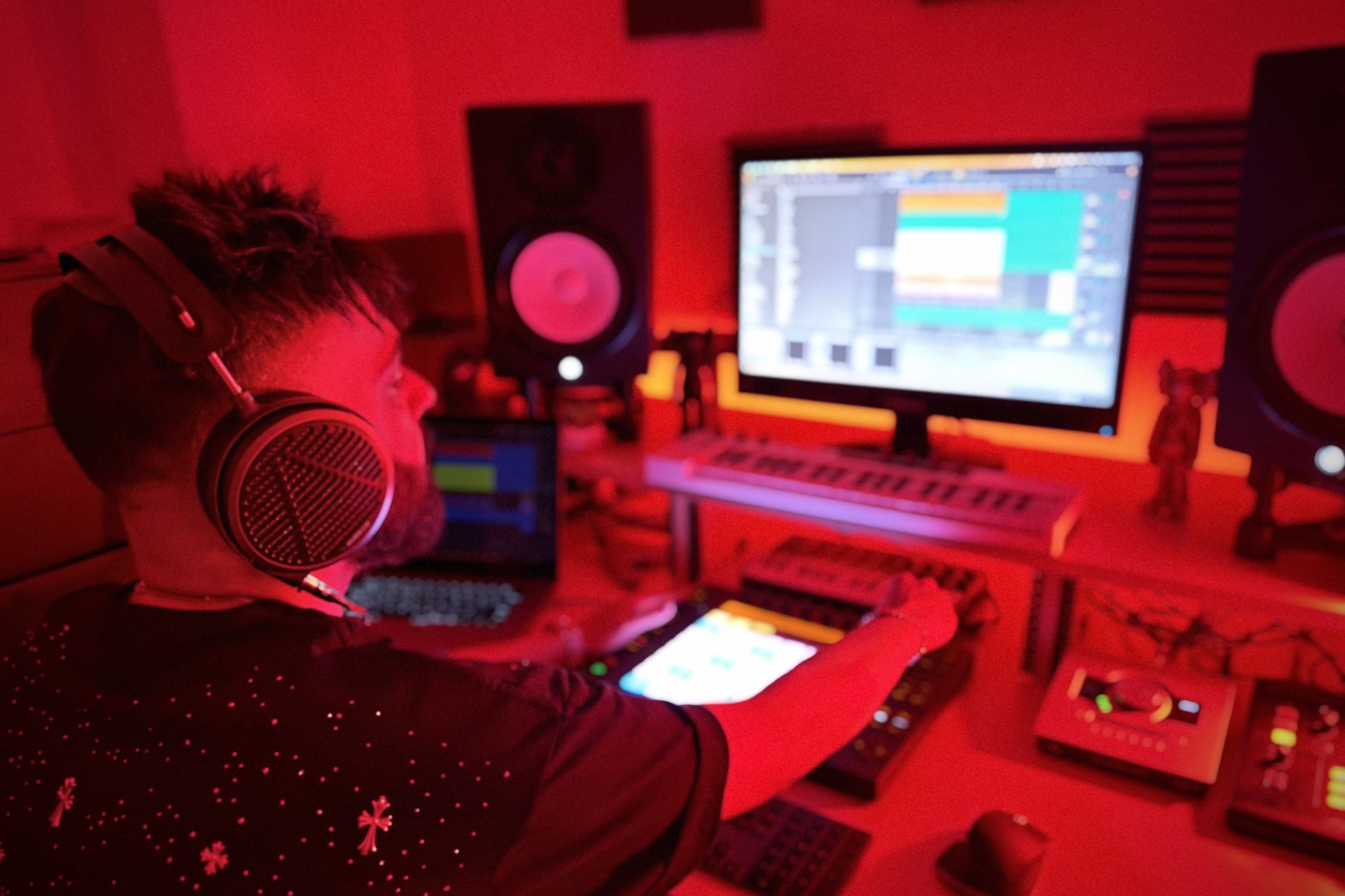 UpsideDown wearing Audeze MM-500 headphones in the studio 