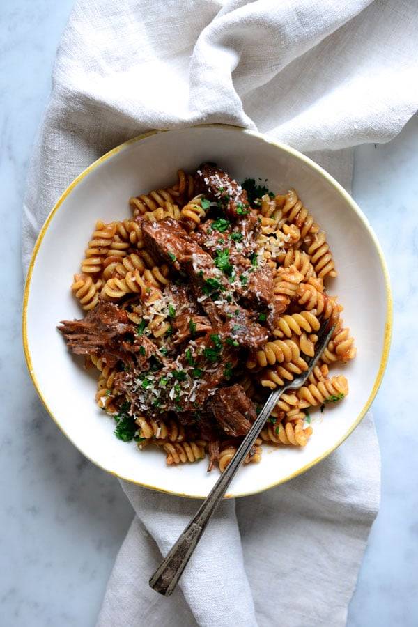 Braised beef in a ragu sauce with fusilli pasta