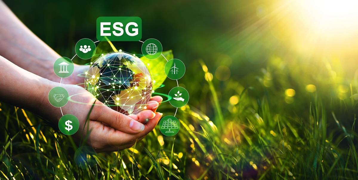 hand holding ESG icons