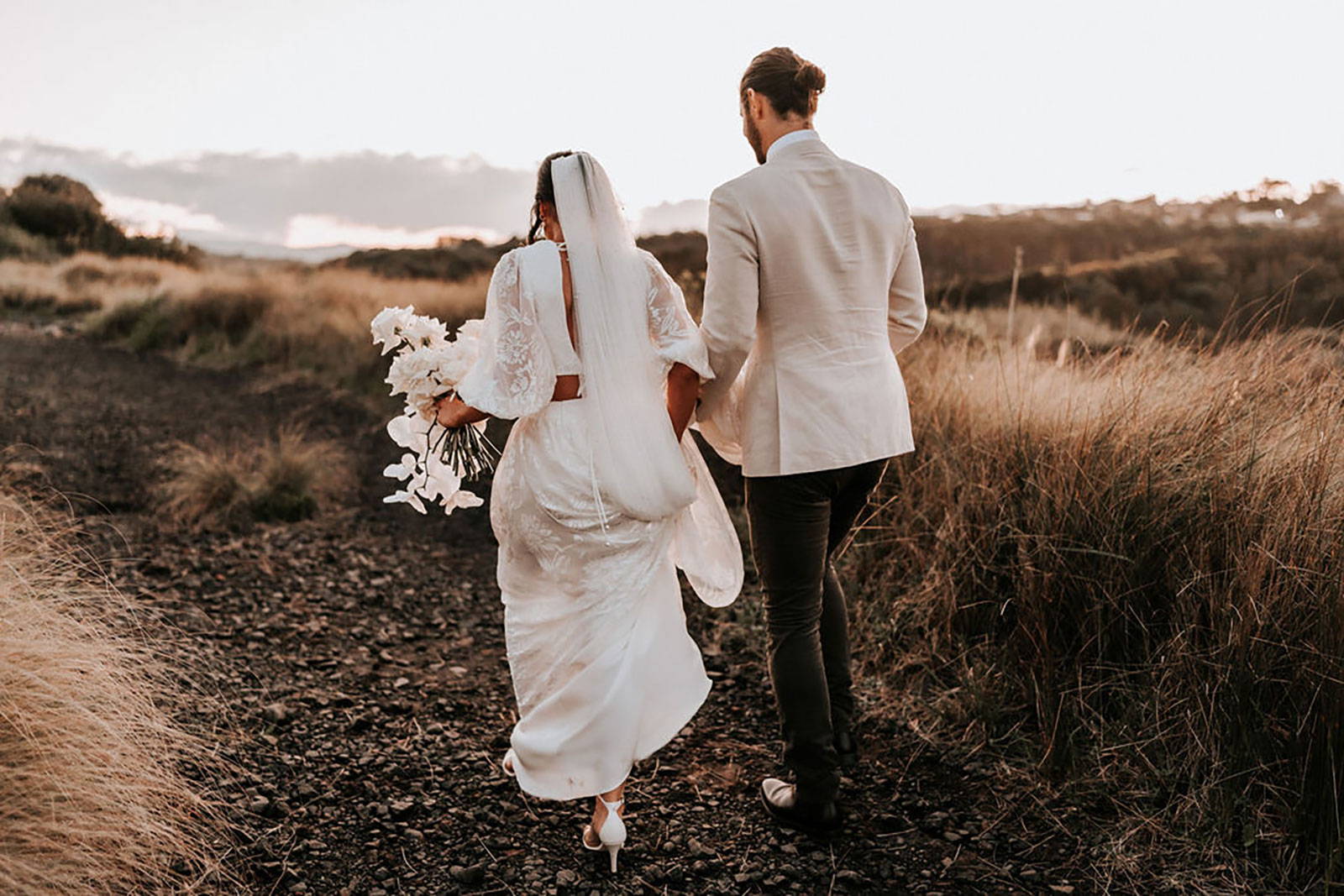 Bride and Groom walking away into Gerringong Hinterland