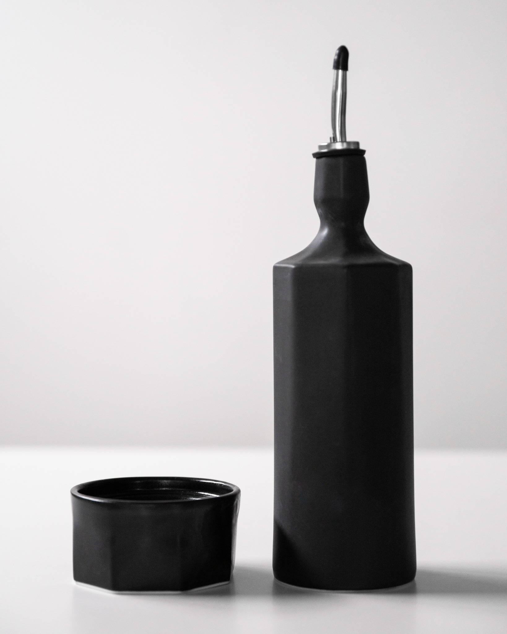 Black olive oil dispenser + black salt cellar