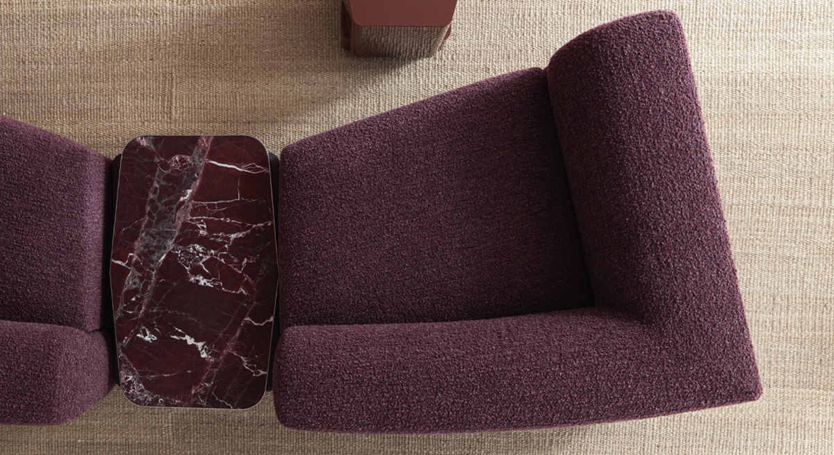 Top view of a modern purple Emile sofa by Molteni & C with marble accents.