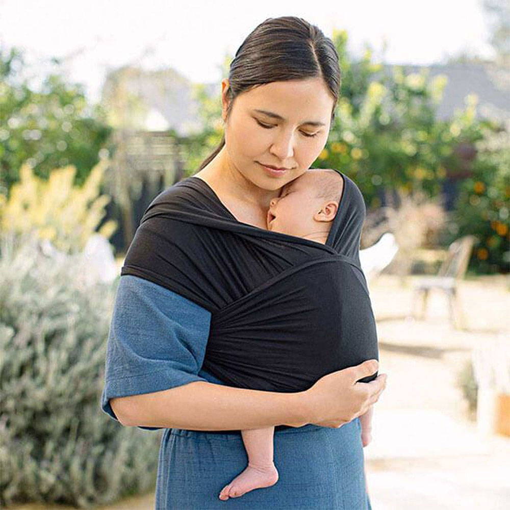 Mother and baby in the Ergobaby Aura Wrap in Black