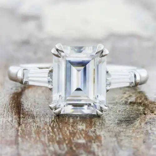 three stone emerald cut diamond ring