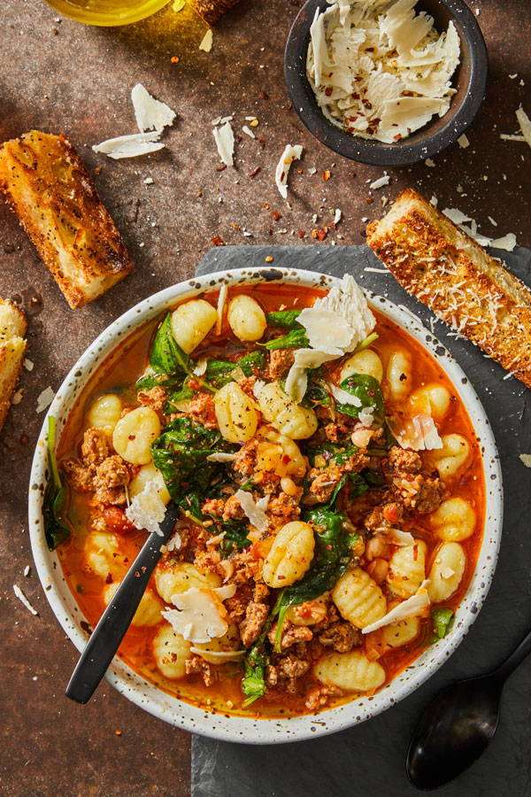 A tomato based soup with gnocchi, italian sausage, and white beans.