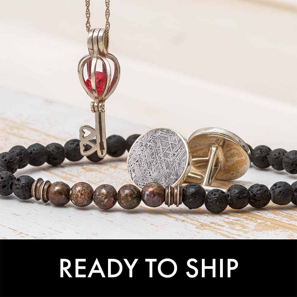 Jewelry display with a heart key necklace and beaded bracelet, 