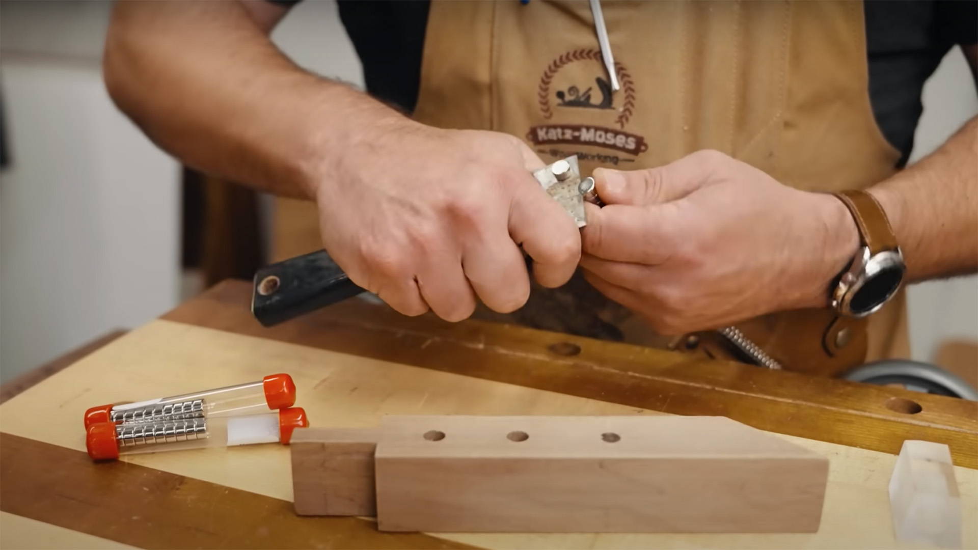 separating magnets with putty knife