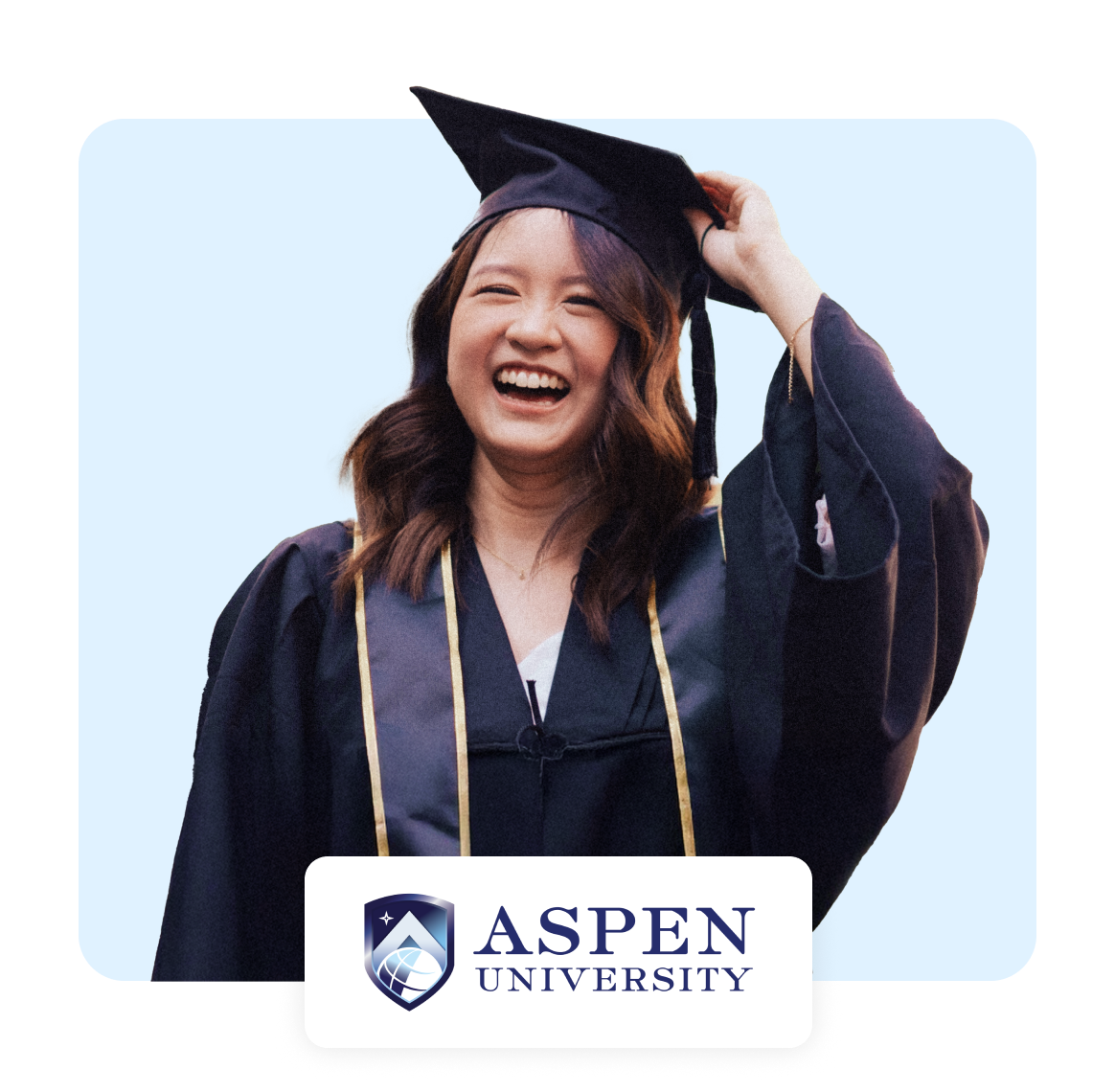 Smiling graduate wearing a cap and gown, celebrating achievement at Aspen University.