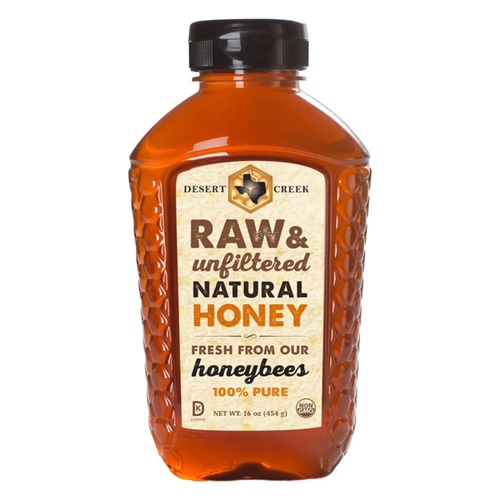 Bottle of raw and unfiltered natural honey with a textured design.